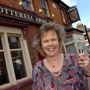 Gill Kirby staged the last darts tournament at the Cotterell Arms Pub in April 2014.