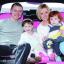 Mia Williams (front left), who has just been given the all-clear from cancer, is pictured wearing her wig from the Little Princess Trust alongside sister Eva, dad Lee and mum Zoe.