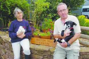 Directors Julie Milsom and John Trimble with Grant the guinea pig and Mist the puppy.