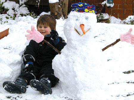Jay Matthews & his snowman. Hereford.