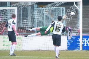 Hereford’s Adam Bartlett is beaten by Ricky Sappleton’s fine shot.