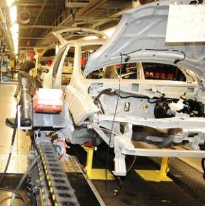 The motor industry has been given a double boost with huge investments by two of the UK's biggest carmakers