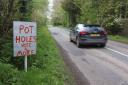 We shouldn't have to pay so much until Herefordshire's roads are fixed!
