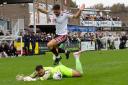 Ethan Freemantle challenges for the ball in his first league start for Hereford