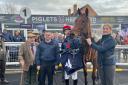 Johnny Mac ridden by Lee Edwards won the Novices' Handicap Chase