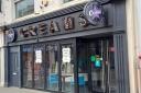Signs have been put up at Creams Cafe in Hereford saying it's under new management