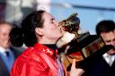 Rachael Blackmore kisses the Gold Cup after her victory in 2022 (David Davies/PA)