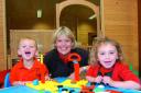Back learning at Jack in the Box Nursery are Oliver Bouston and Scarlett Warr (right) with Jackie Barratt.