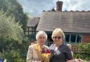 June Bromage, original member and past president, was presented with a gift by Grove Ladies Golf Club’s current lady president Sue Price