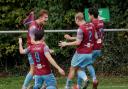 Westfields’ players celebrate after Rory Thompson pulls them level against Fairford Town.