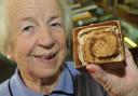 Hazel Hodges holds the Chelsea bun sent to her dad on the front line of the First World War. It features as part of an exhibition held at Leominster Library from next month. Photo: Andy Compton. is on display at Leominster Museum in Herefordshire. The