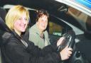 Christie Neal with driving instructor Heather Thompson. 084629-1.
