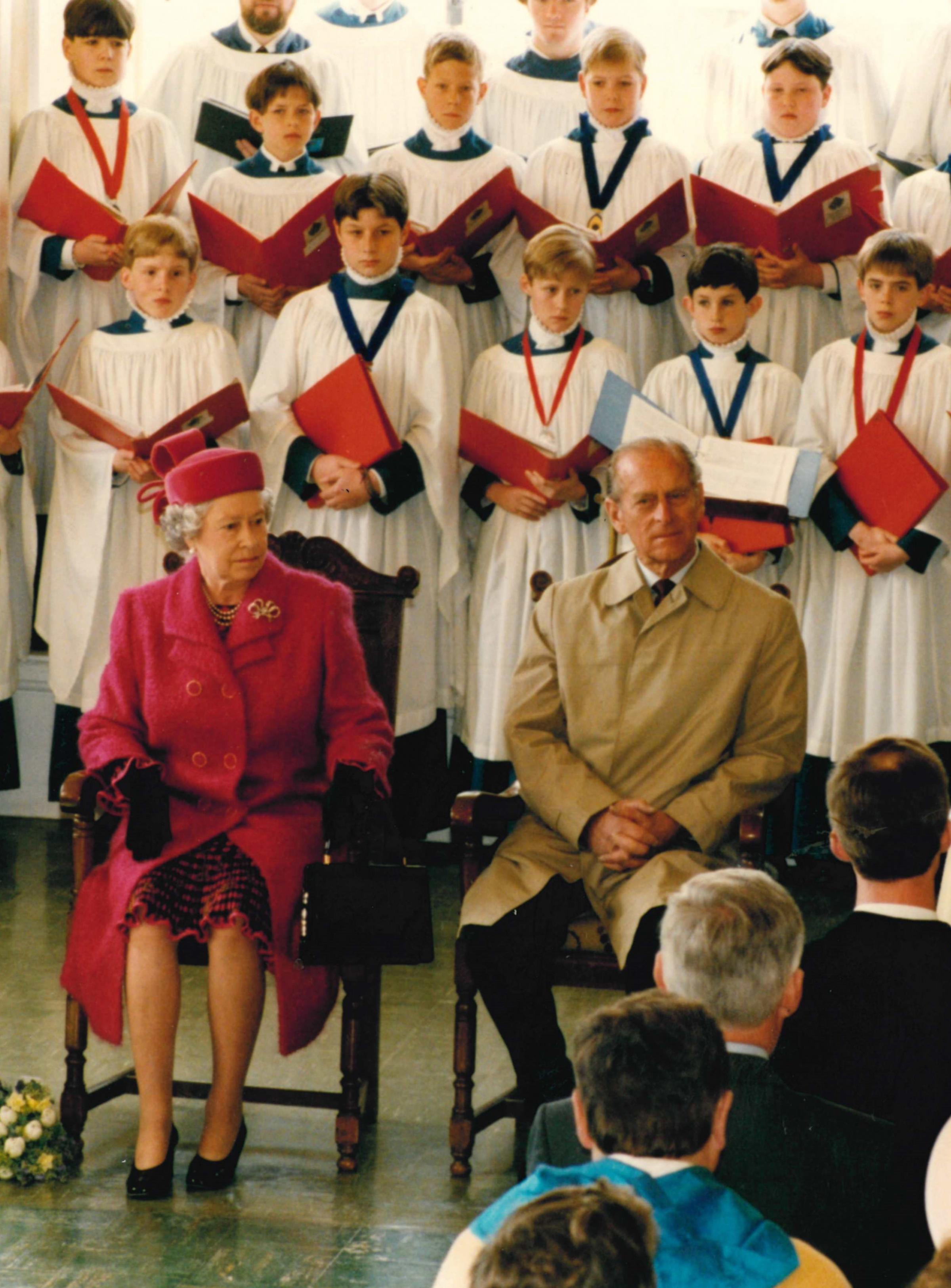 The Queen sits alongside Prince Philip during a visit