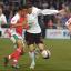Gary Hooper in action against Wrexham's Neil Taylor