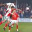 Theo Robinson beats Neil Taylor to a header Theo Robinson beats Neil Taylor to a header
