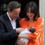 Prime Minister David Cameron and his wife Samantha with their baby daughter Florence
