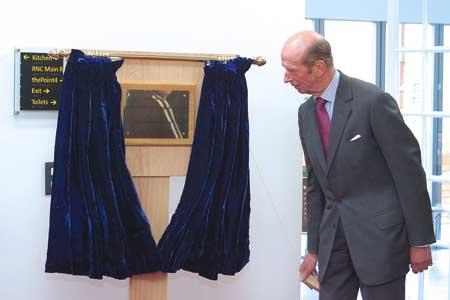 HRH The Duke of Kent unveils a plaque to mark the official opening of Gardner Hall.