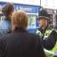 A policeman advises members of the public about the road closures. A policeman advises members of the public about the road closures.