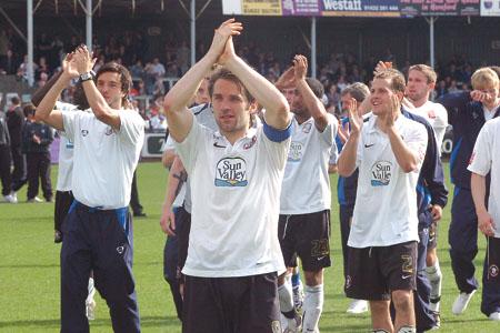 Club Captain Ben Smith leads the players as they applaud the fans on a lap of honour.