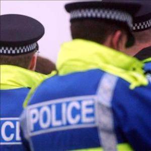 Armed police were shot at after responding to an incident in London