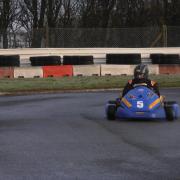 Cam Wheatley in action in the Luck Trading Ltd sponsored MSC Racing Inc GX200 Kart