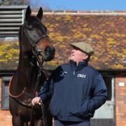 Trainer Paul Nicholls poses for a photograph with Clans Des Obeaux in the yard during the visit to Manor Farm Stables, Ditcheat. PA Photo. Picture date: Thursday February 27, 2020. See PA story RACING Nicholls. Photo credit should read: Andrew