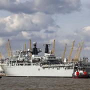 The HMS Albion set against Greenwich and the O2 Arena. Royal Navy