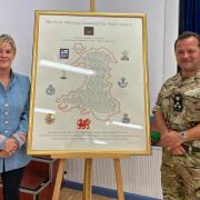 Clare Villar's artwork was presented to the 160th Welsh brigade