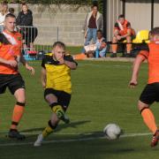 Jake Robinson scoring for Kington Town against New Dales Vale. Picture: Andy Compton
