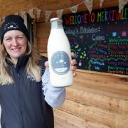 Lucy Mason outside the Merrivale Farm shop in Little Birch with a fresh pint of Merrimilk. Picture: Rob Davies