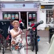 One million people have watched retired raver Iris shaking a leg to busker Jason Allan's tunes in Hereford's High Town