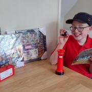 Jack with some of his Royal Mail themed gifts.    Picture courtesy of the Maddock family