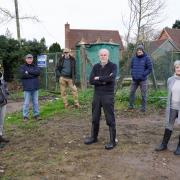 Julian Stokes (centre) with other concerned residents at the Yapole sewage pumping station. Picture: Rob Davies