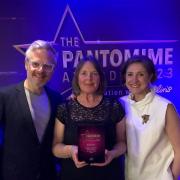 From left: Ellis Kerkhoven, Estelle van Warmelo and Madeleine MacMahon with the Best Director award for Beauty and the Beast at the UK Pantomime Awards