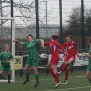 Sarah Bishop steers home the winning goal to send Hereford Pegasus Ladies top of the table