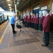 Hereford Rail Male Voice Choir performs at Hereford Station
