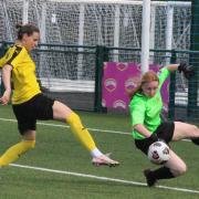 Roxy Dinsecu scores for Hereford Pegasus Ladies in their win over Army Reserve Women