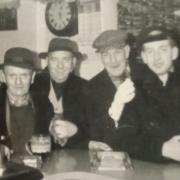 Locals enjoying the pub in the early 1960's.