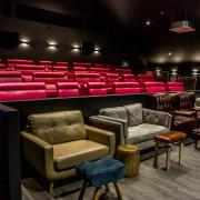Comfy sofas are provided at the Gateway Cinema