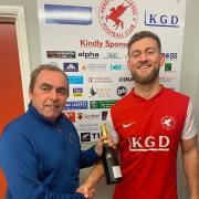 Hereford Pegasus player Mike Burgess receiving his award as man of the match by Les Chambers from match sponsors Willowbank Properties.