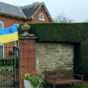 house with Ukrainian flag