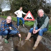 Kevin Harlock (left), Caroline Wilkie (middle) and Ronnie Wilkie (right) feel they are cut off because of the state of the road near their homes in Kinnersley