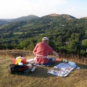 Richard Bavin painting on the Malvern Hills