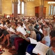 The massed choir at rehearsals at Holy Trinity Church. Photo: Derek Foxton