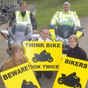 Promoting the bike safety campaign are Ann Mann, of Herefordshire Council (left), John Hodges, of IAM, Steve Jordan, from Hereford and Worcester Fire and Rescue Service, Sgt John Roberts, of West Mercia Police, and Vicki Bristow, from the Safer Roads