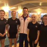 Herefordshire teenager, Caitlin Livingston (second from right), with former Olympic swimmer Thomas Haffield and fellow students Lucy Creasey, Ellie Horton and Eva Barry