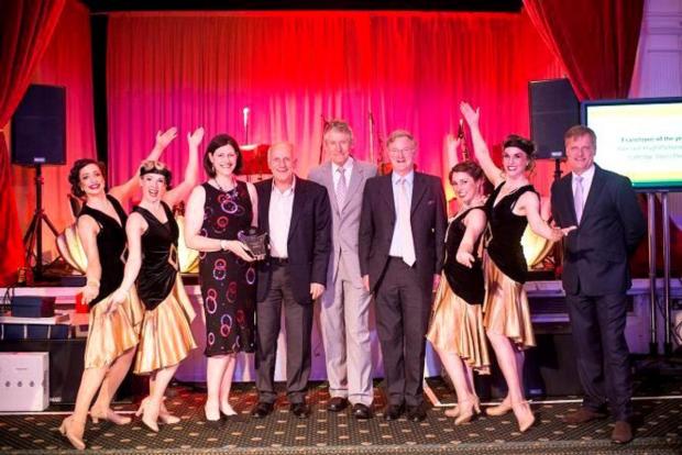 From left to right &#40;exclucing dancers) are: Alex Pattison-Appleton; Dennis Haines &#40;CEO of Badger Office Supplies); Rod Young &#40;Cartridge World chairman and Global CEO); Hugh Pattison-Appleton; John Richardson &#40;president of Europe, Middle East and Africa, c