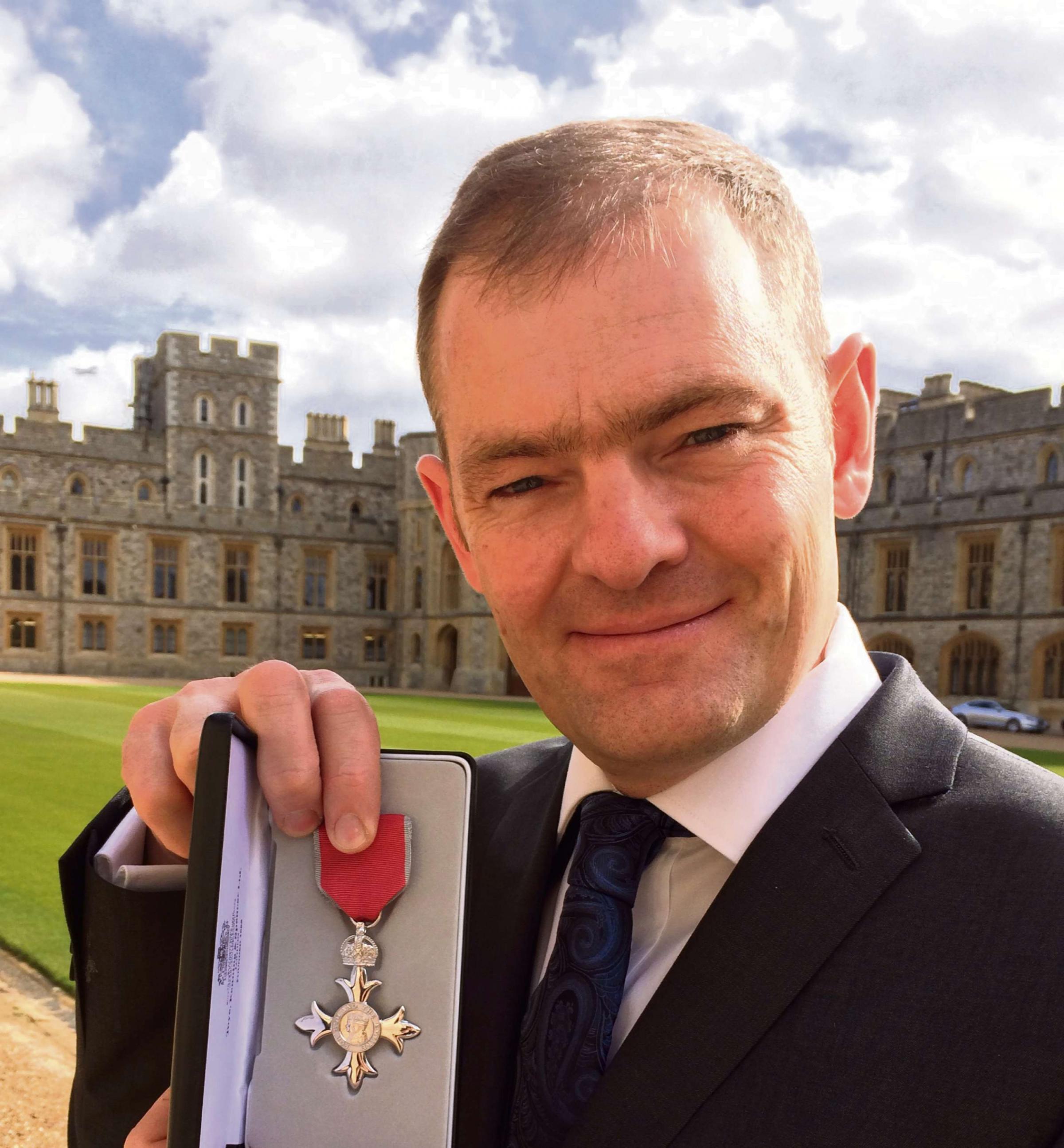Malcolm Russell has been awarded an MBE for going above and beyond to help others - 2910623