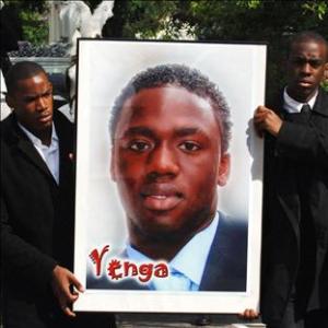 Mourners at the funeral of Kodjo Yenga in London