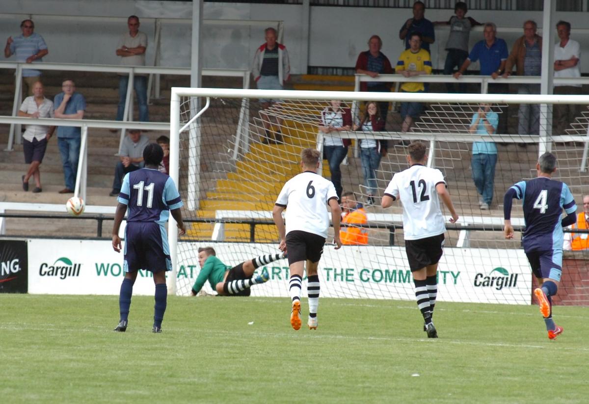 Luke Williams saves a penalty but St. Neots score from the rebound.